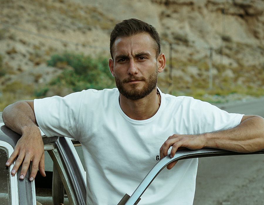 Ex-military man with short hair and a beard